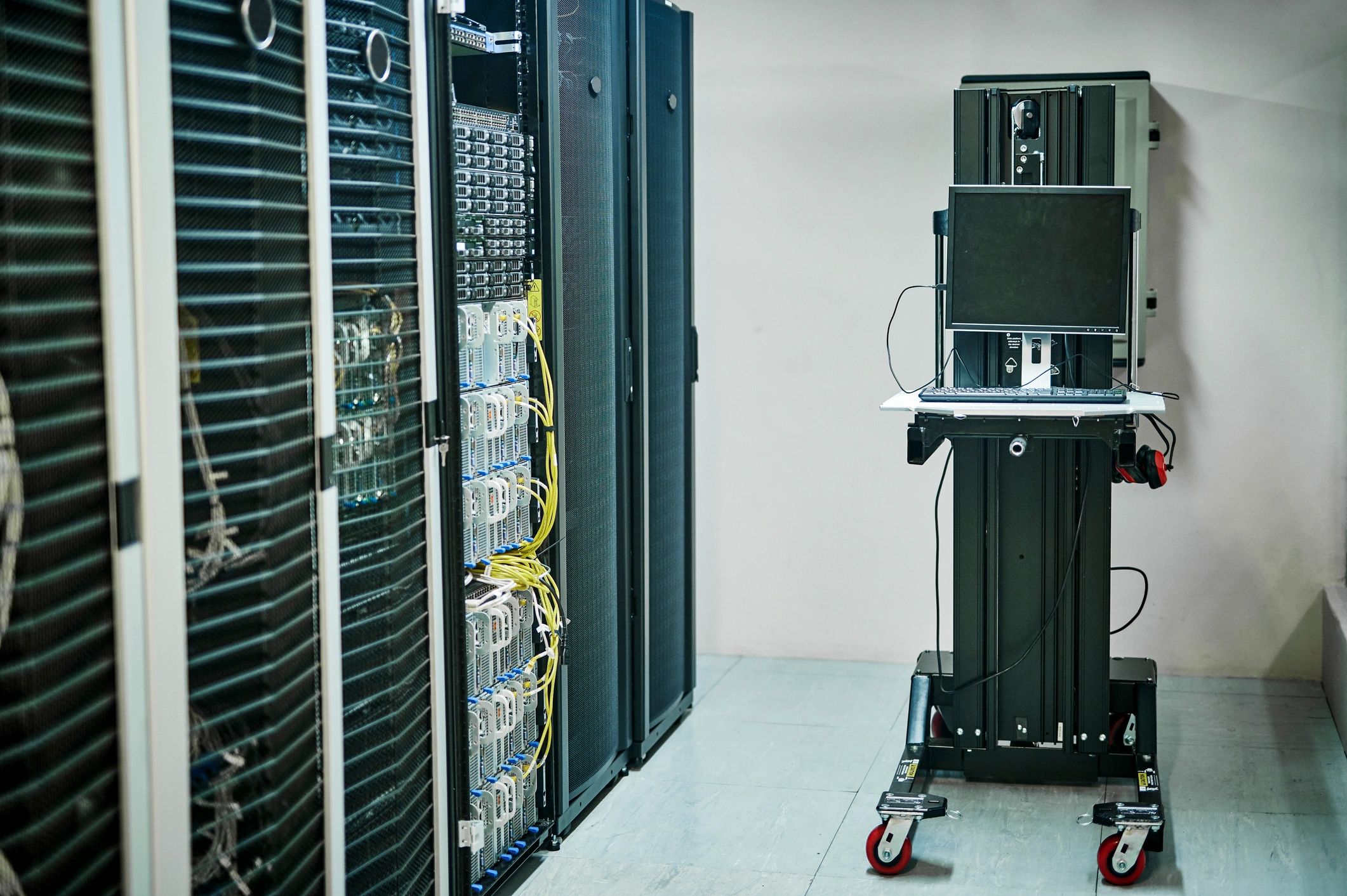 Modern server room with racks and blue lighting