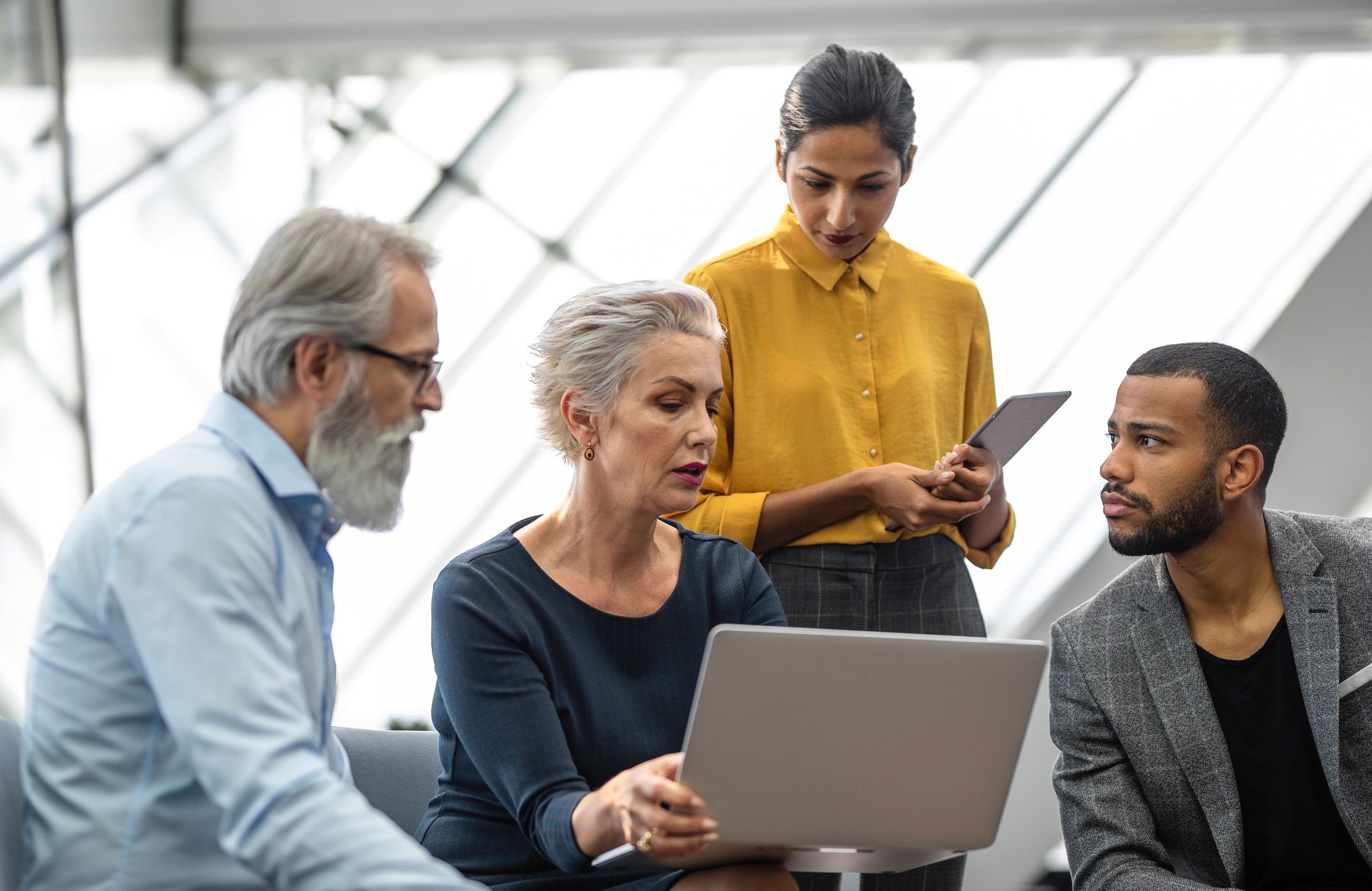 Enterprise software team collaborating in a modern office